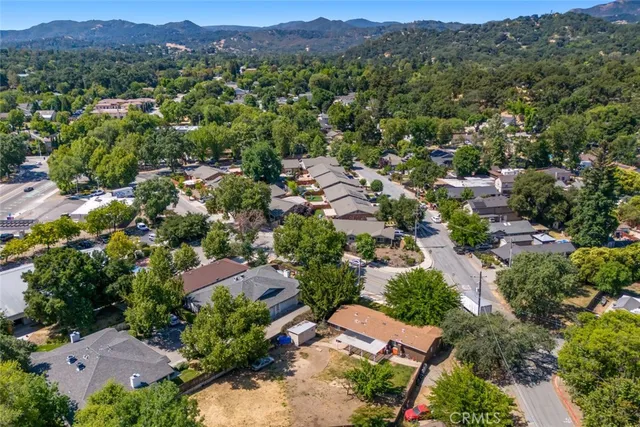 an aerial view of a city with lots of residential buildings