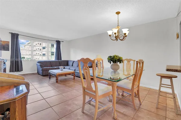 a view of a livingroom and dining room
