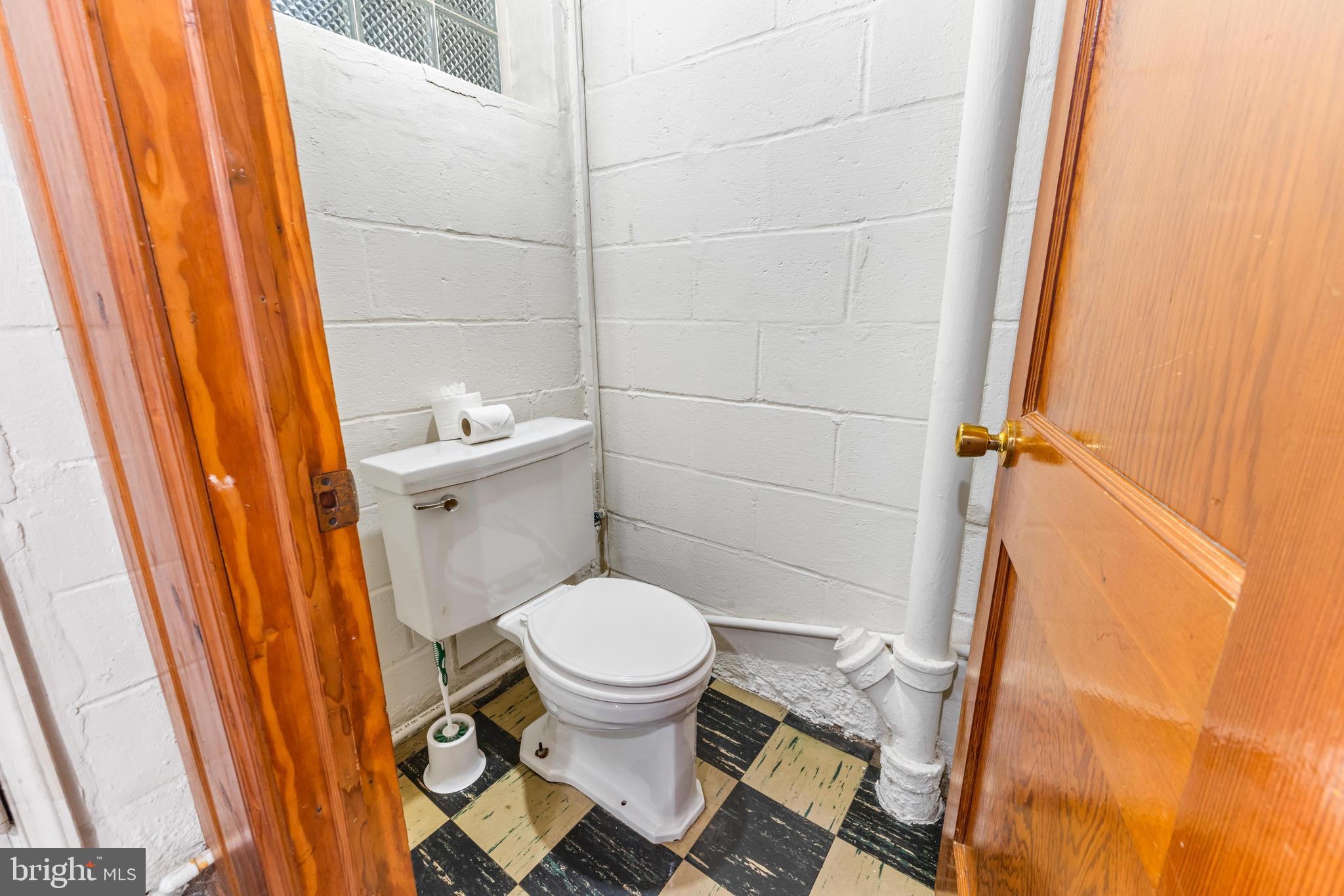 2245 Searles Road Baltimore, MD 21222 - Photo 24 of 33 a bathroom with a sink and a toilet