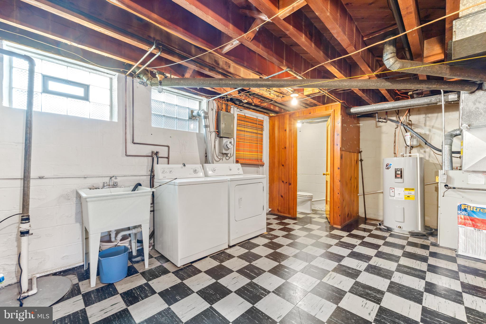 2245 Searles Road Baltimore, MD 21222 - Photo 25 of 33 a room with a black white checkered floor