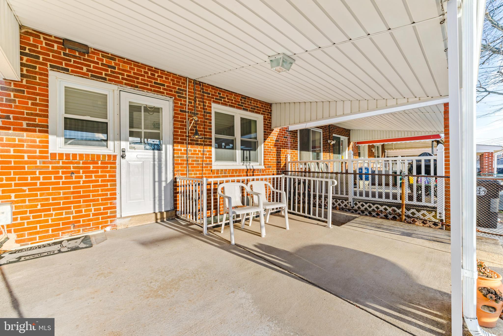2245 Searles Road Baltimore, MD 21222 - Photo 26 of 33 front view of a house with a porch