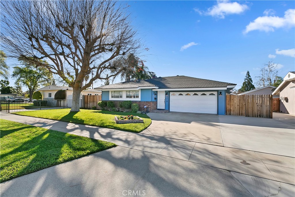 5318 Scott Avenue Riverside, CA 92504 - Photo 1 of 1 a view of a house with swimming pool and yard