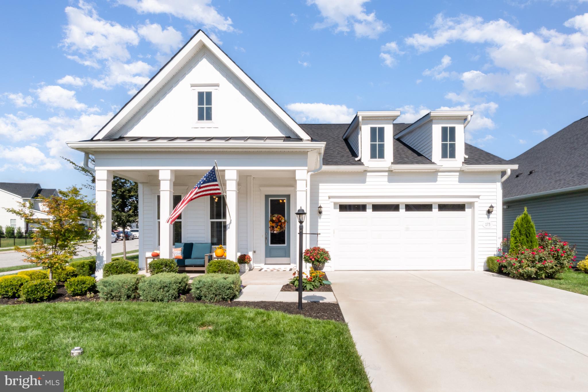 173 Lively Stream Way Gettysburg, PA 17325 - Photo 1 of 59 a front view of a house with a yard and garage