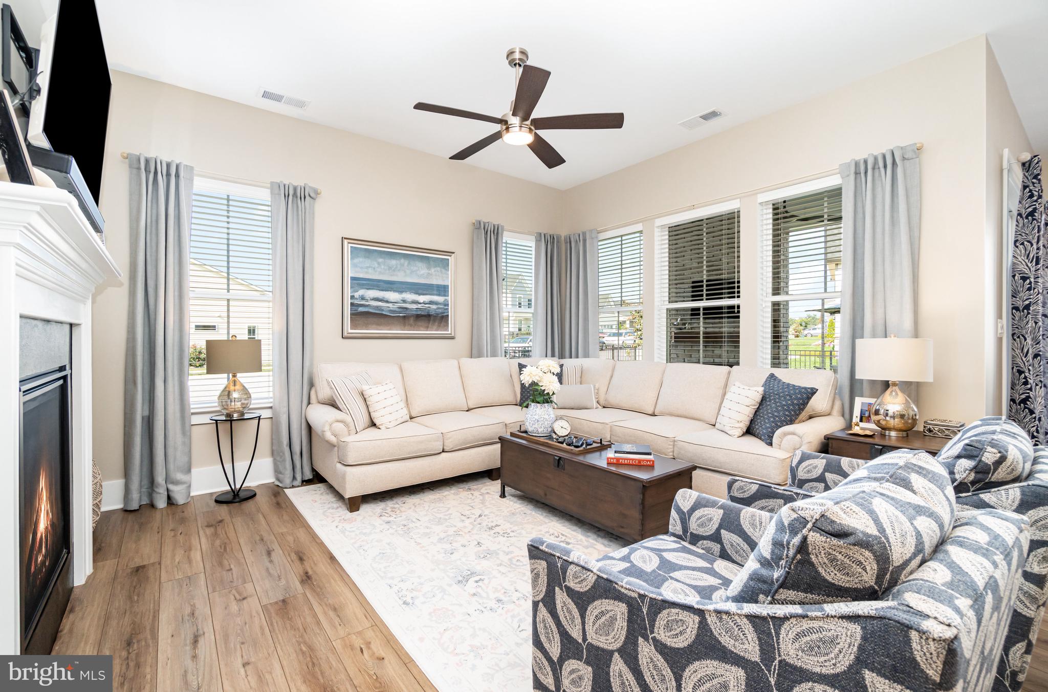 173 Lively Stream Way Gettysburg, PA 17325 - Photo 11 of 59 a living room with furniture ceiling fan and a window