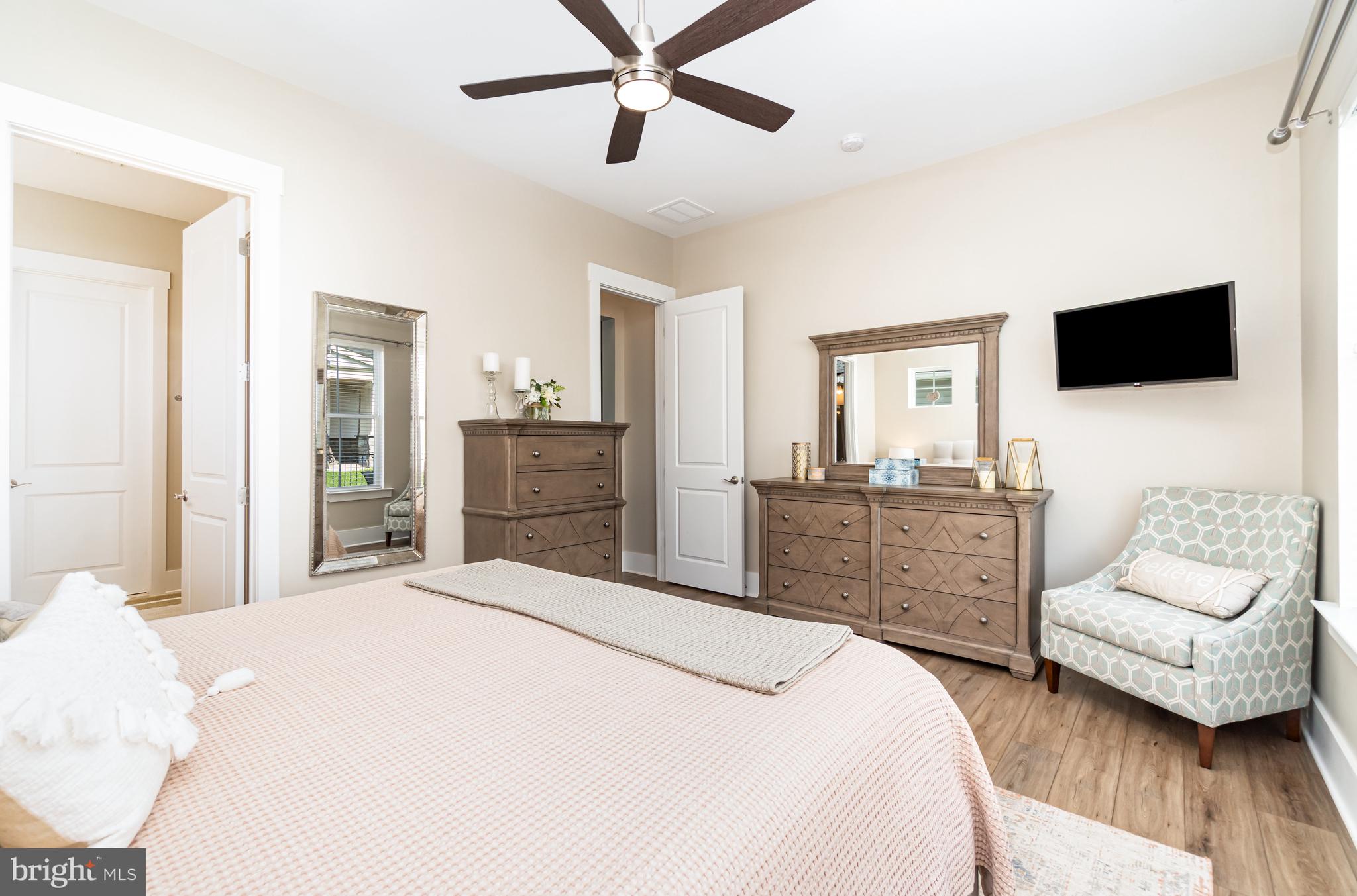 173 Lively Stream Way Gettysburg, PA 17325 - Photo 20 of 59 a bedroom with a bed and a couch