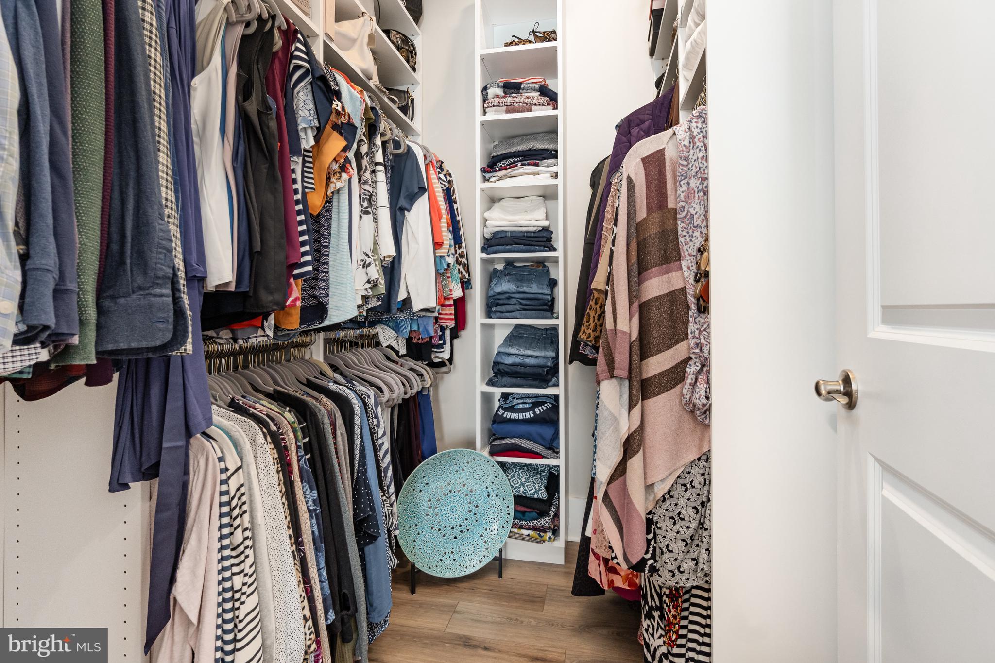 173 Lively Stream Way Gettysburg, PA 17325 - Photo 22 of 59 a view of walk in closet with clothes and shoes