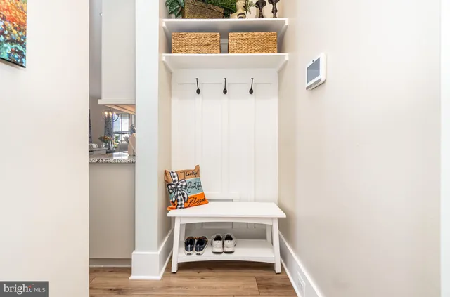 a outdoor space with patio couch and a fireplace