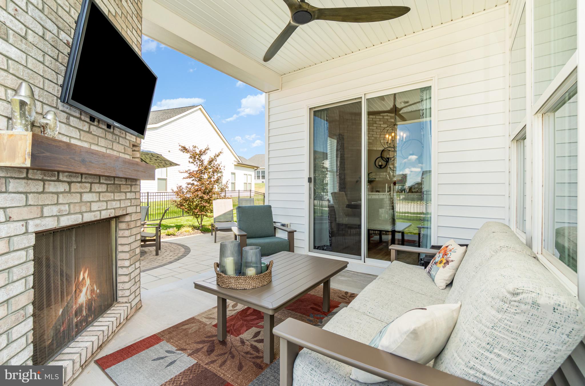 173 Lively Stream Way Gettysburg, PA 17325 - Photo 29 of 59 a outdoor space with patio couch and a fireplace