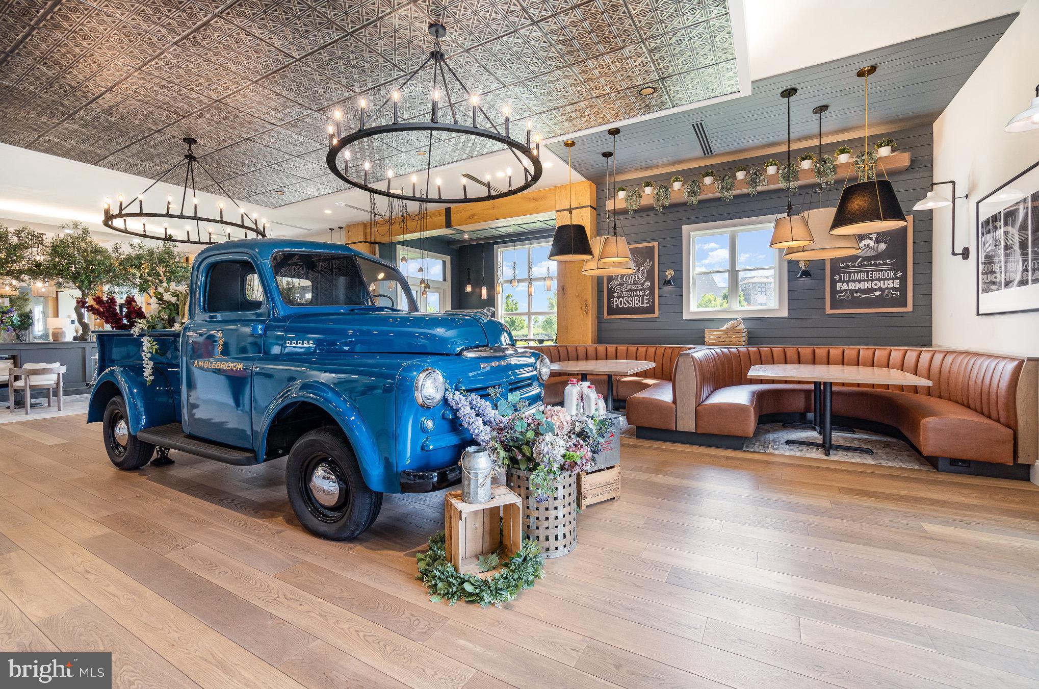 173 Lively Stream Way Gettysburg, PA 17325 - Photo 35 of 59 a living room with furniture a fireplace and a chandelier