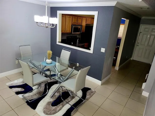 a view of a livingroom with furniture and window