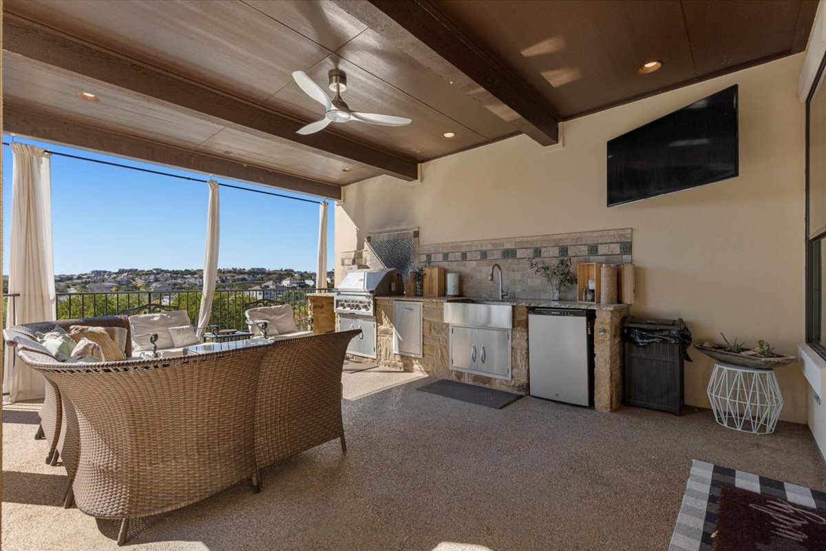 3708 Lajitas Leander, TX 78641 - Photo 27 of 40 Patio off breakfast area with grill, sink, fridge, perfect for entertaining and watching the game!