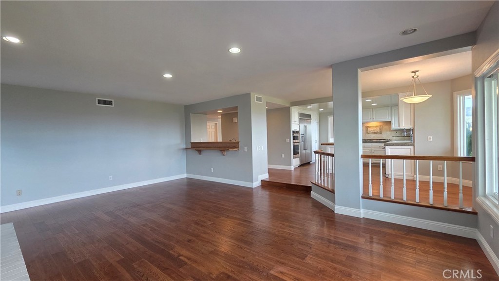 8 Miranda Irvine, CA 92603 - Photo 14 of 32 an empty room with wooden floor and windows