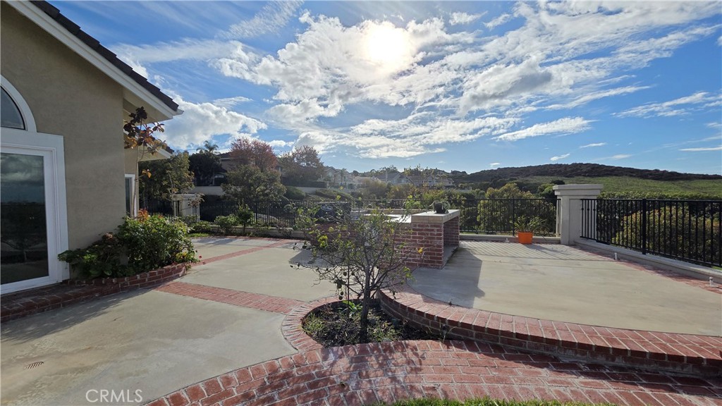 8 Miranda Irvine, CA 92603 - Photo 30 of 32 a view of a patio with couches table and chairs and potted plants