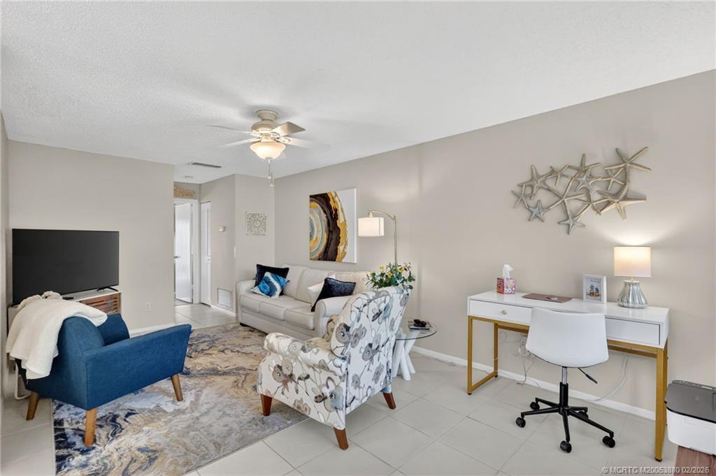 2600 Southeast Ocean Boulevard, Unit M10 Stuart, FL 34996 - Photo 1 of 36 Open living room with office space.