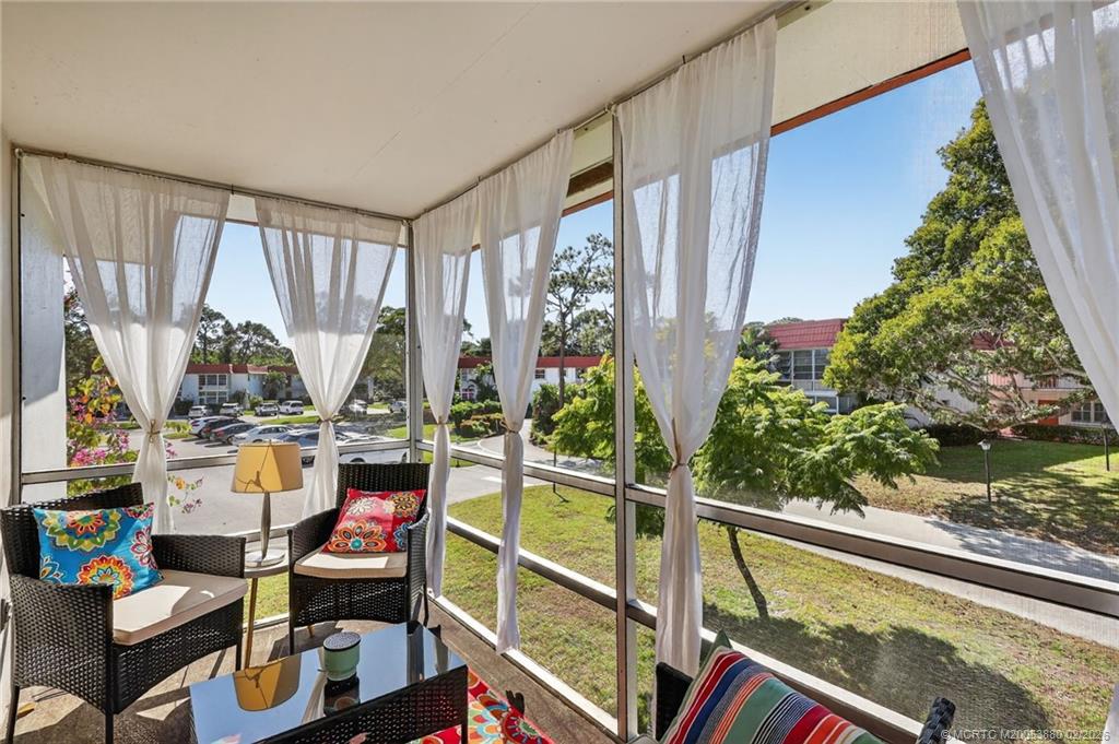 2600 Southeast Ocean Boulevard, Unit M10 Stuart, FL 34996 - Photo 11 of 36 Enjoy the outdoors from this beautiful screened, shaded balcony.