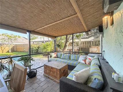 a outdoor living space with furniture and garden view