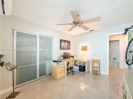 a view of a workspace with furniture