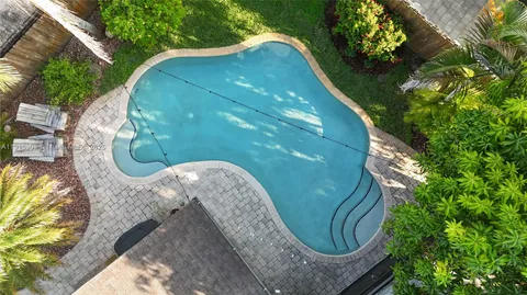 an aerial view of a swimming pool