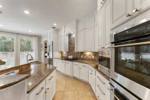 $1,225,000 | 6 Lagato Place, Spring, TX 77382