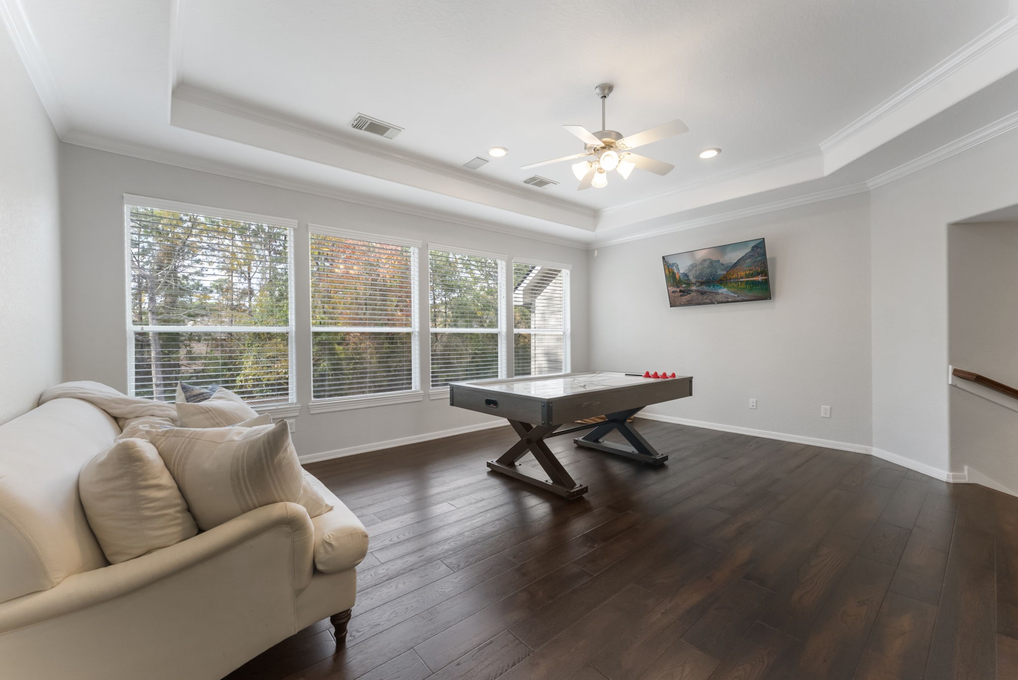 6 Lagato Place Spring, TX 77382 - Photo 24 of 42 This secondary view highlights the room’s generous proportions and open layout. Ideal for a game table, media seating, or a shared family retreat.
