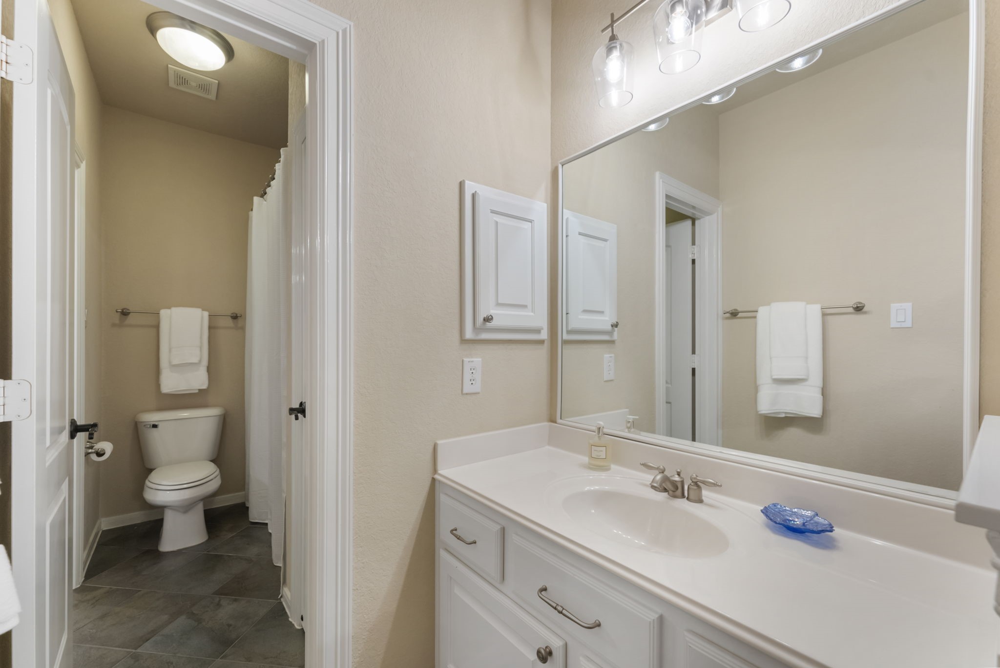 6 Lagato Place Spring, TX 77382 - Photo 27 of 42 A bright secondary bath features a wide vanity, clean finishes, and a tub/shower combination. Thoughtfully designed for everyday use and guest comfort.