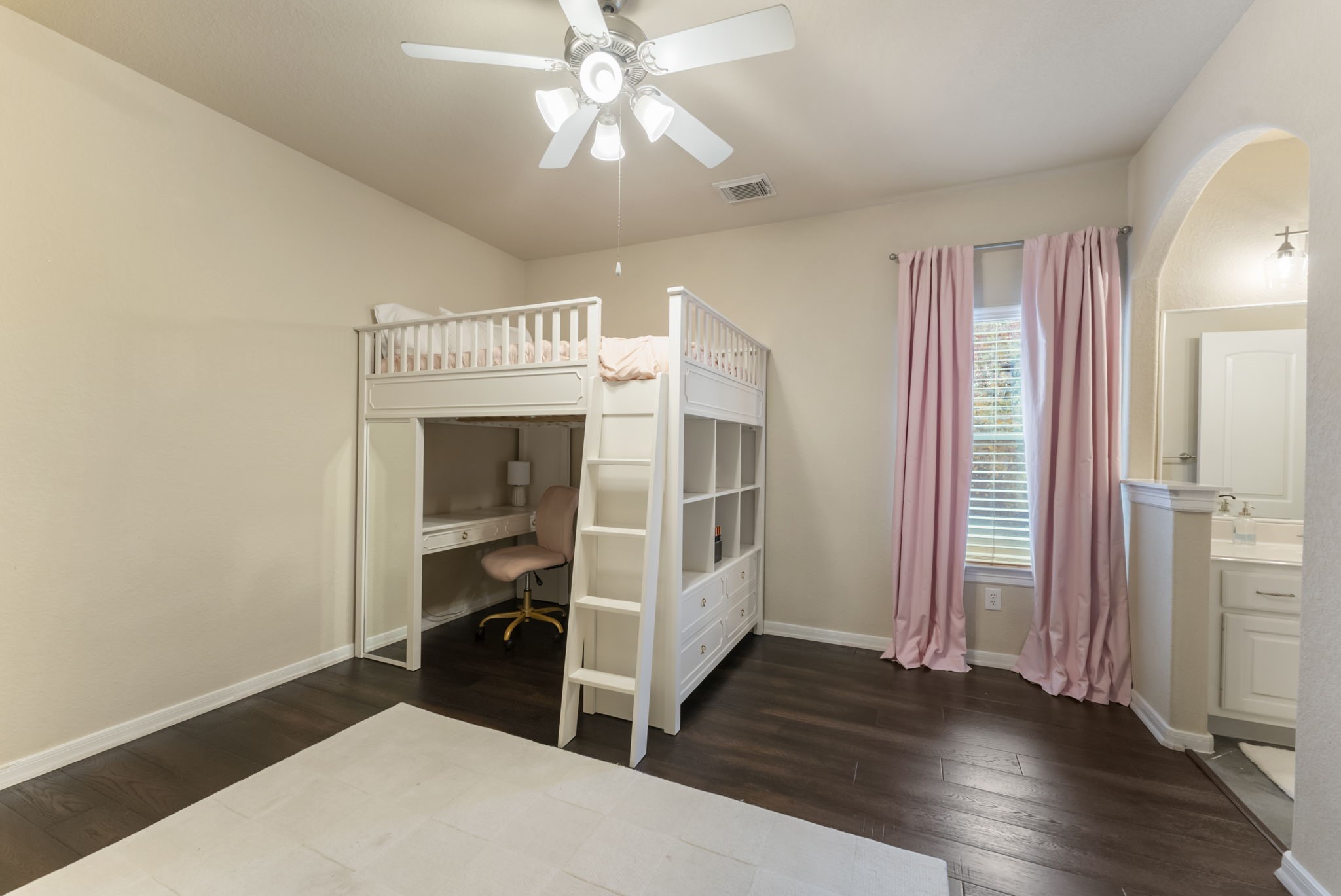 6 Lagato Place Spring, TX 77382 - Photo 29 of 42 Bedroom features walk-in closet and connection to its private sink and vanity. Ideal for guests or family members seeking their own space.