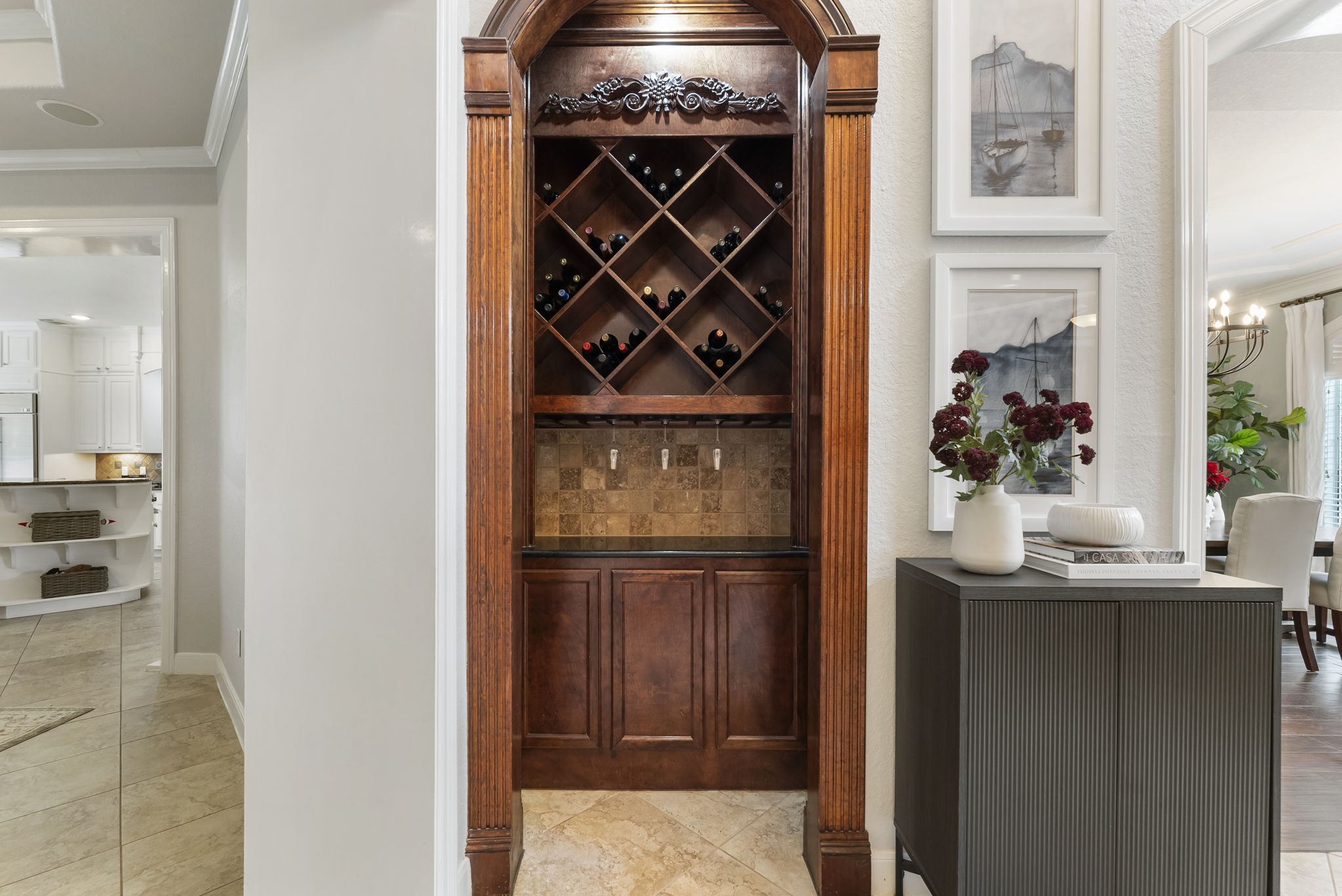 6 Lagato Place Spring, TX 77382 - Photo 7 of 42 A dedicated wine nook with built-in storage and display adds character and function to the home. Perfectly positioned for entertaining or everyday enjoyment.