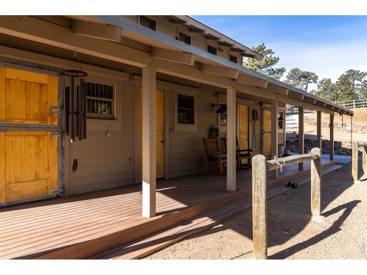 7321 Flagstaff Road Boulder, CO 80302 - Photo 44 of 50 Barn front porch and hitching posts