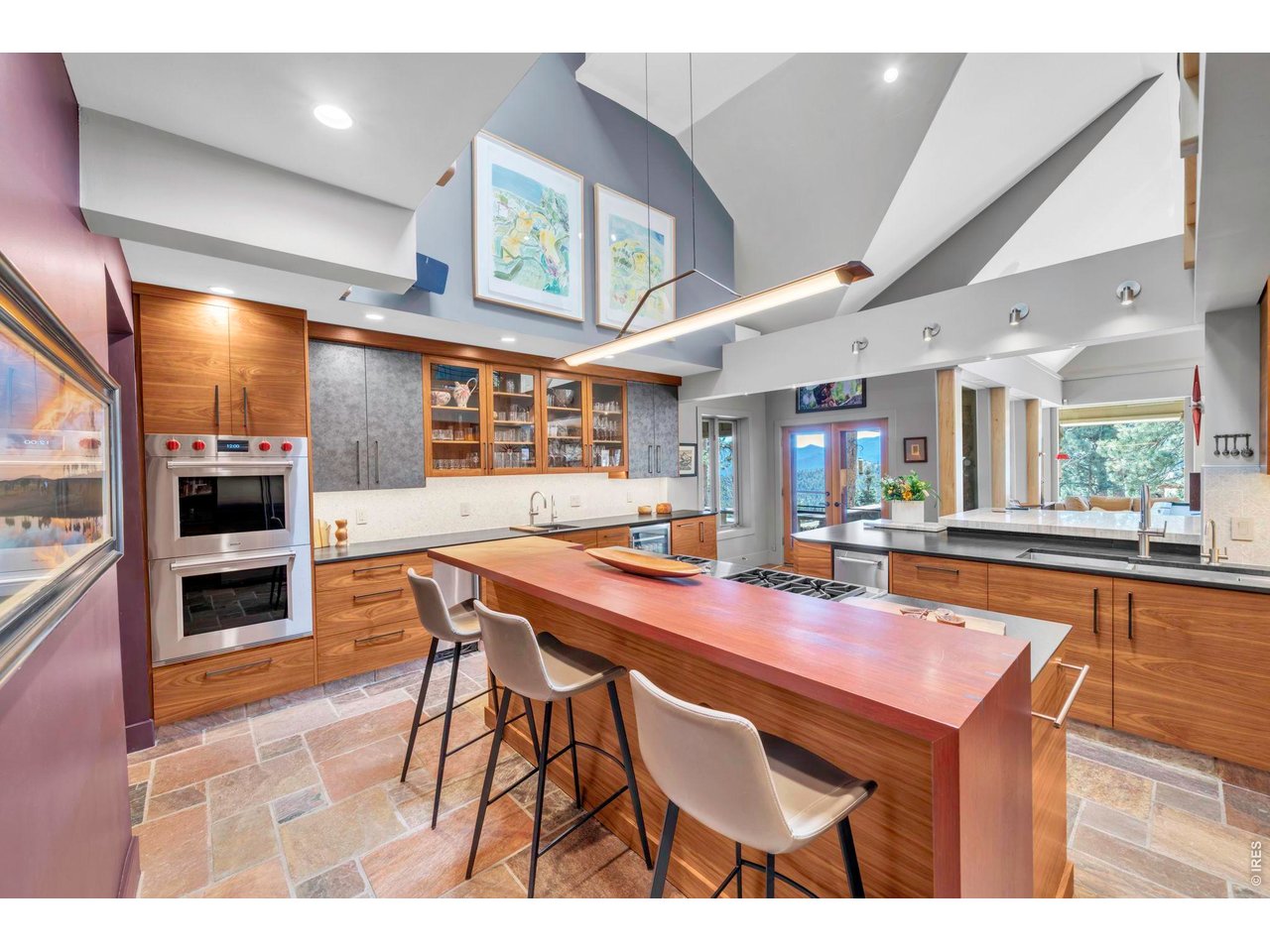 7321 Flagstaff Road Boulder, CO 80302 - Photo 7 of 50 Stunning kitchen remodel featuring custom walnut cabinets, Bubinga hardwood dining counter, and a Wolf double oven