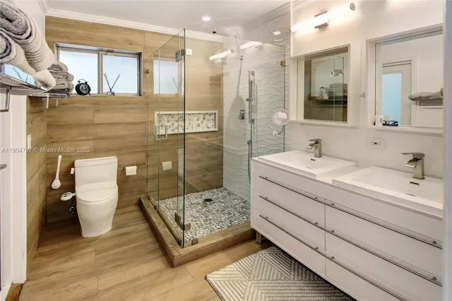 a bedroom with a large bed and a couch