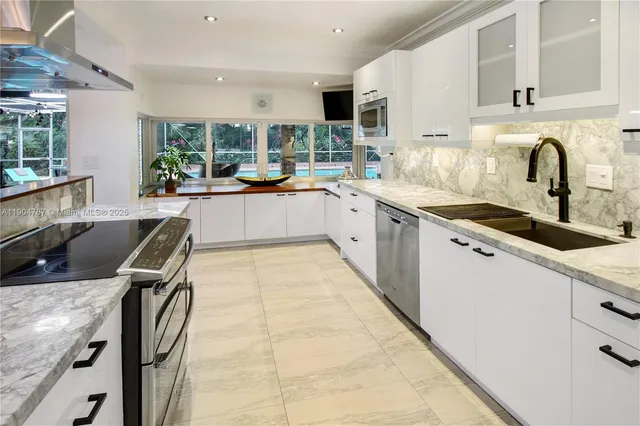 a view of a swimming pool with a patio