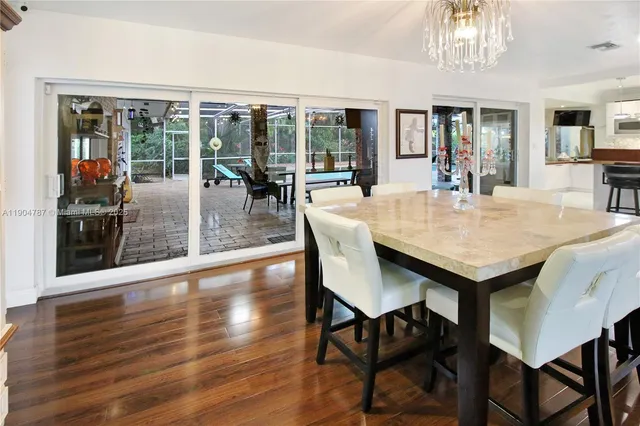 a view of a house with a yard porch and sitting area