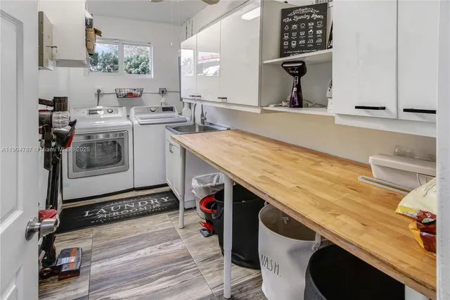 a bedroom with a bed window and wooden floor