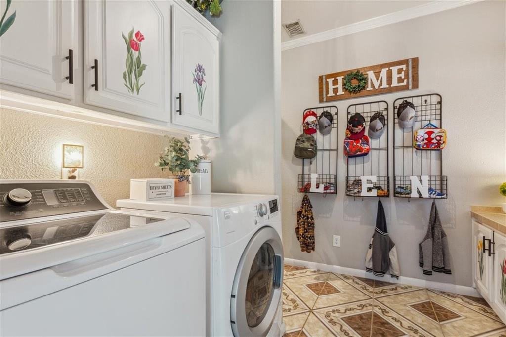 3356 Kattner Road Riesel, TX 76682 - Photo 27 of 40 a utility room with dryer and washer