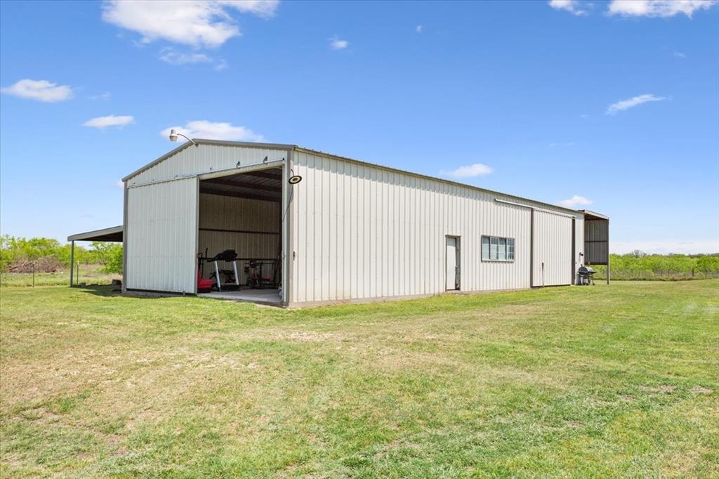 3356 Kattner Road Riesel, TX 76682 - Photo 28 of 40 a big room with an outdoor space