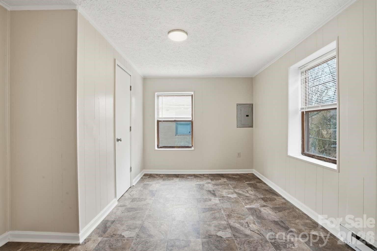 381 North Cleghorn Street Rutherfordton, NC 28139 - Photo 13 of 19 a view of an empty room with window