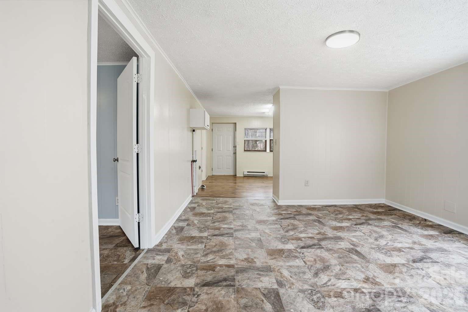 381 North Cleghorn Street Rutherfordton, NC 28139 - Photo 4 of 19 a view of an empty room