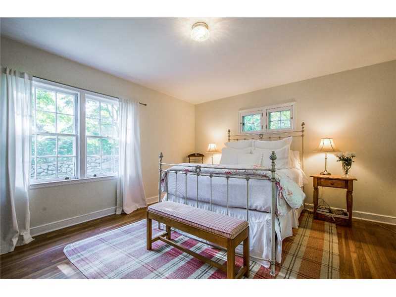 167 West Norwalk Road Norwalk, CT 06850 - Photo 15 of 24 a bedroom with furniture and a window