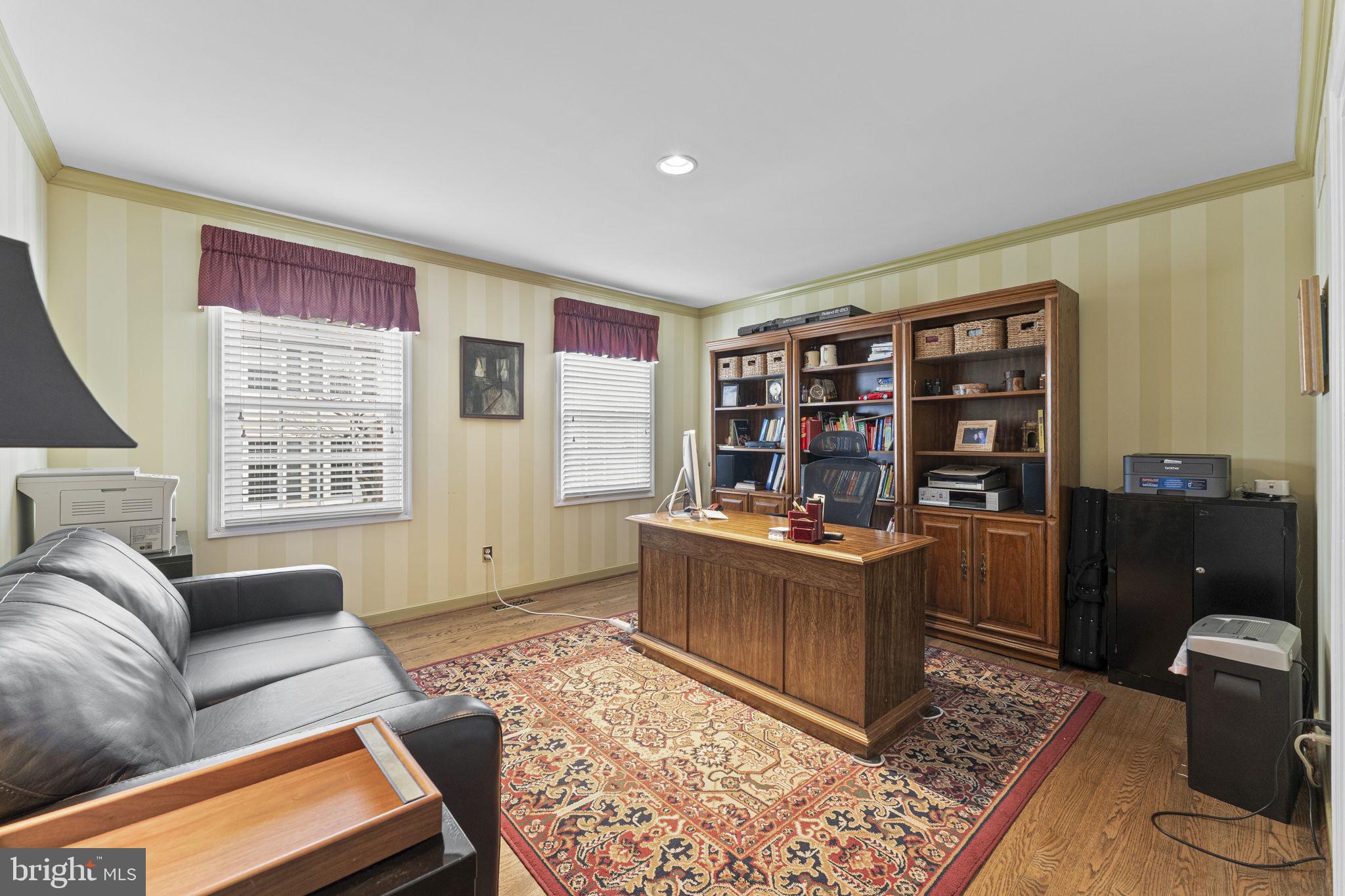 103 Carters Grove, Unit A3 Malvern, PA 19355 - Photo 34 of 41 a living room with furniture cabinets and window