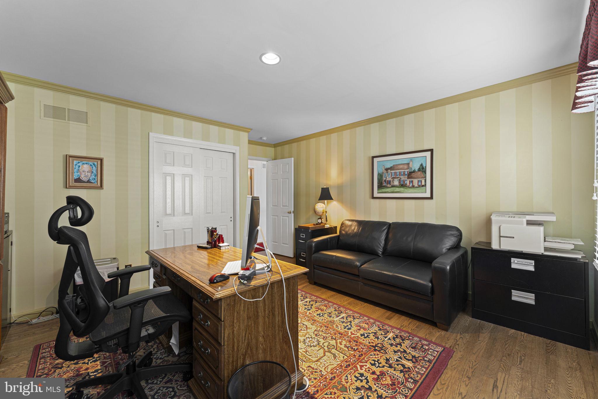 103 Carters Grove, Unit A3 Malvern, PA 19355 - Photo 35 of 41 a living room with furniture a rug and a window