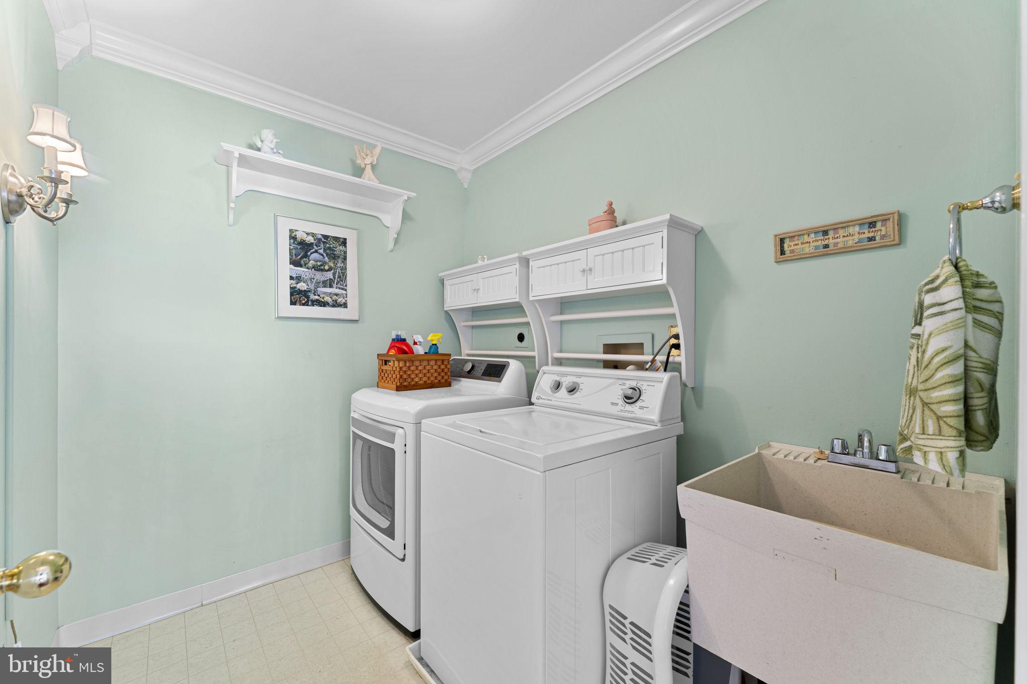 103 Carters Grove, Unit A3 Malvern, PA 19355 - Photo 37 of 41 a utility room with dryer and washer