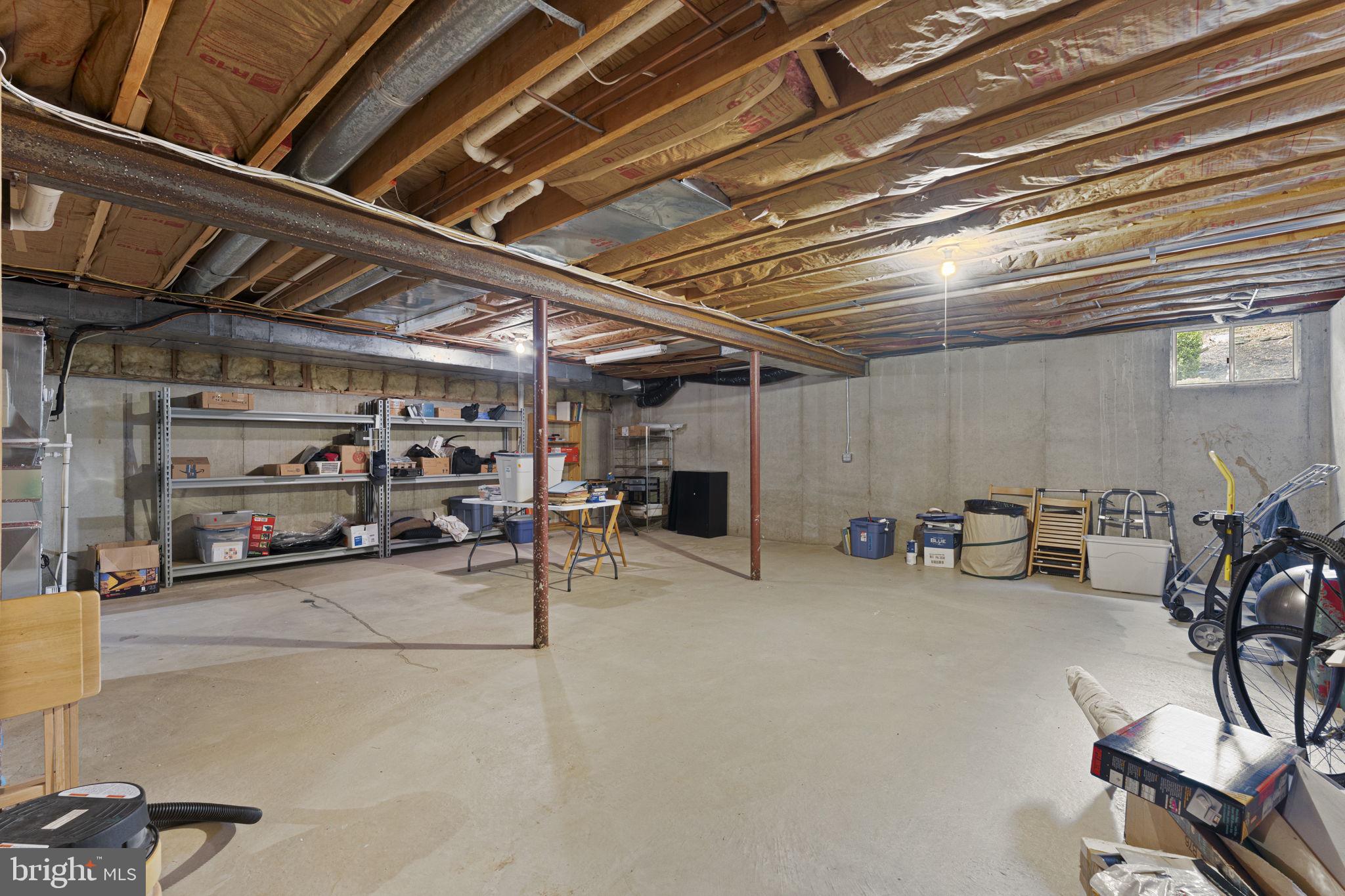 103 Carters Grove, Unit A3 Malvern, PA 19355 - Photo 38 of 41 a view of a garage with furniture
