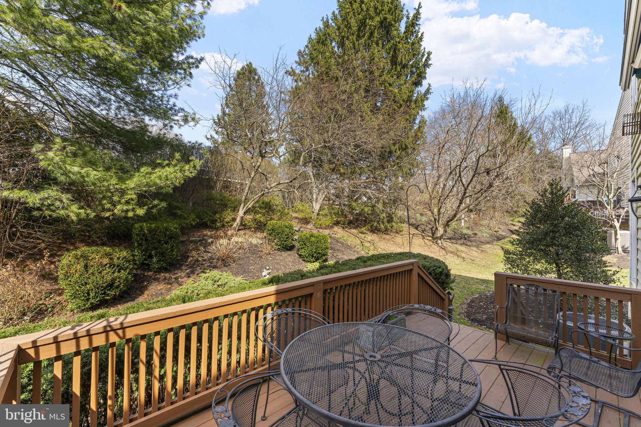 103 Carters Grove, Unit A3 Malvern, PA 19355 - Photo 40 of 41 a view of a balcony with mountain view and wooden fence