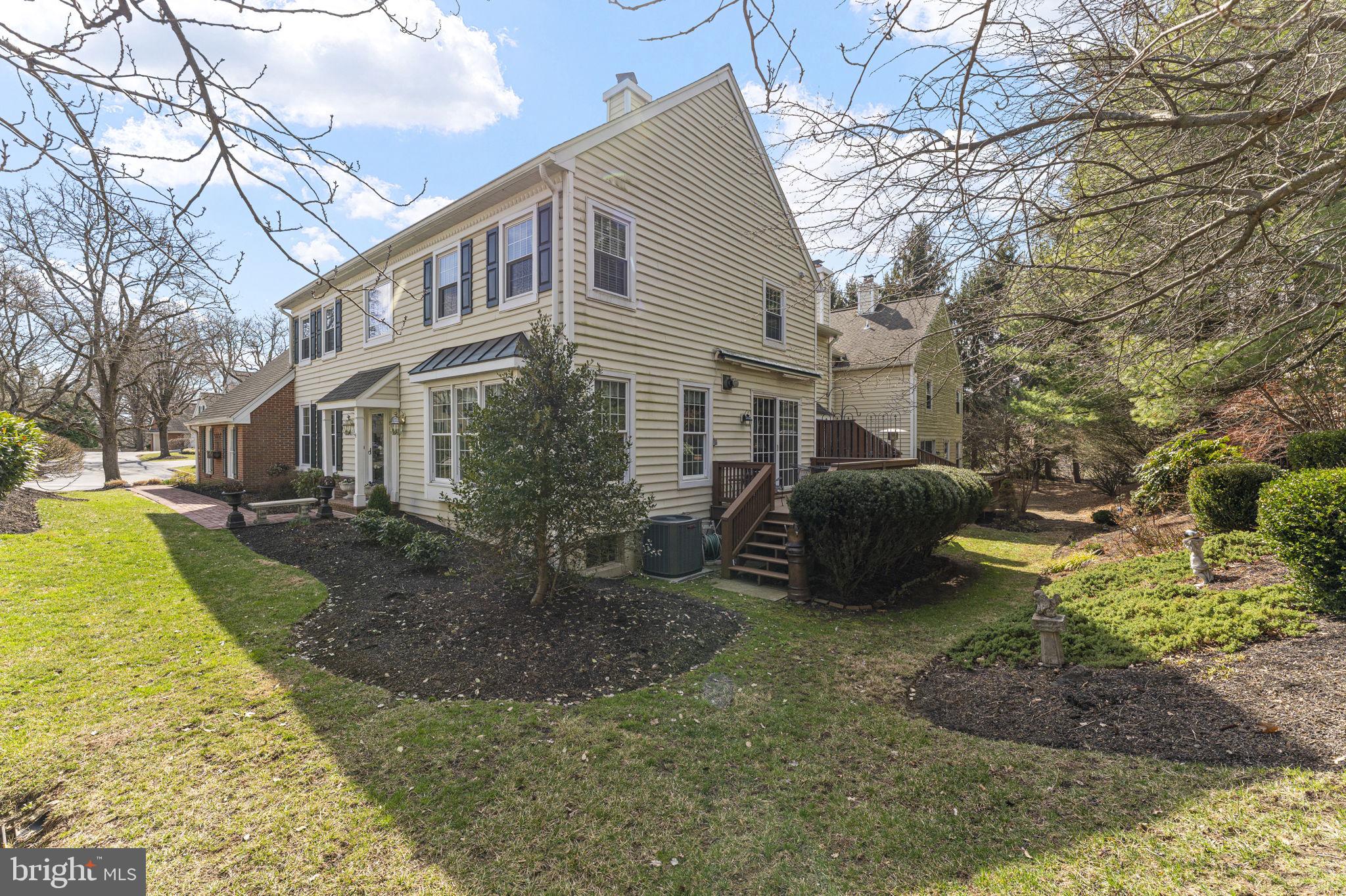 103 Carters Grove, Unit A3 Malvern, PA 19355 - Photo 41 of 41 a view of a house with backyard and trees