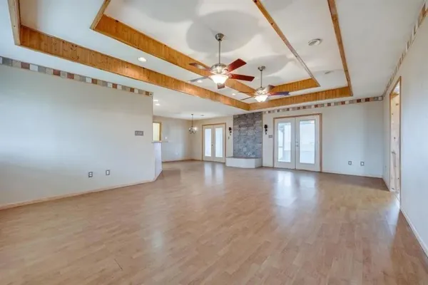 a view of a water heater room with a ceiling fan