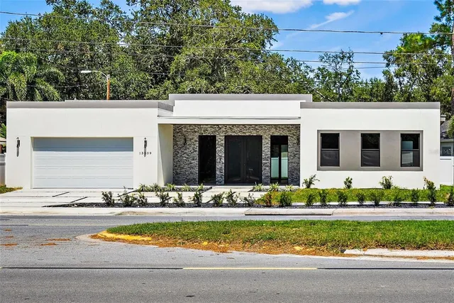front view of house with a yard