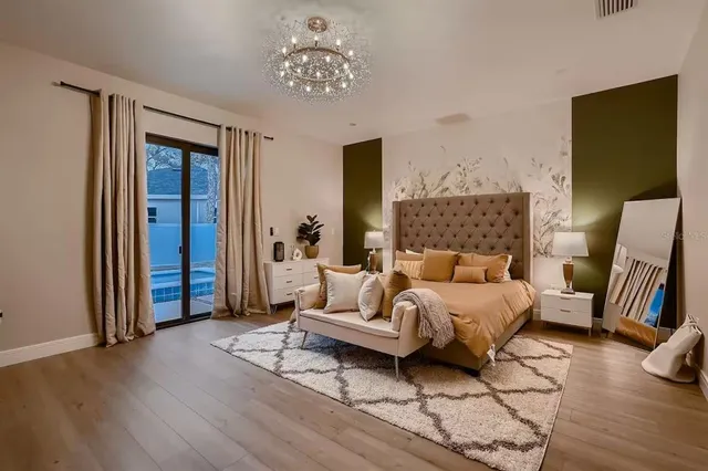 a bed room with a bed and a couch