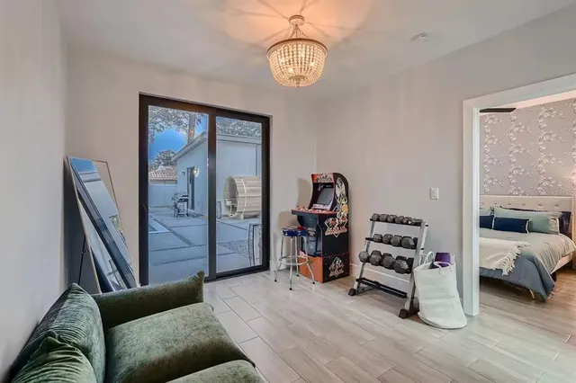 a view of a livingroom with furniture and windows