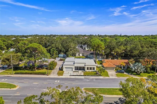 a view of a swimming pool with a yard