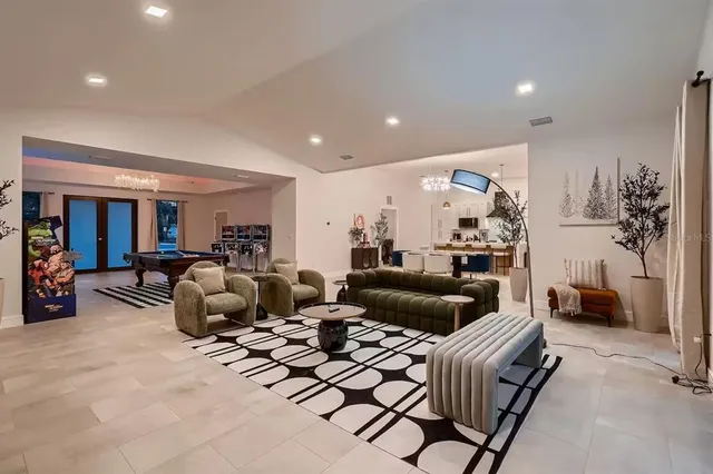 a living room with furniture and a view of living room